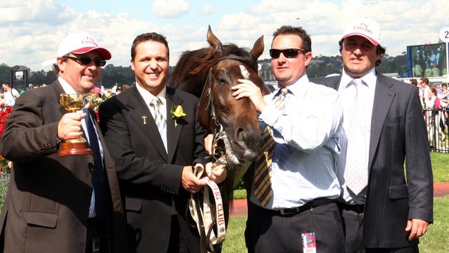 Freedman Brothers Incorporated: (from left) Lee, Richard, Michael and Anthony Freedman with Melbourne Cup queen Makybe Diva.