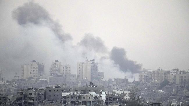 Smoke rises over northern Gaza and destroyed buildings on November 13, 2023 viewed from Sderot, Israel. Picture: Getty Images