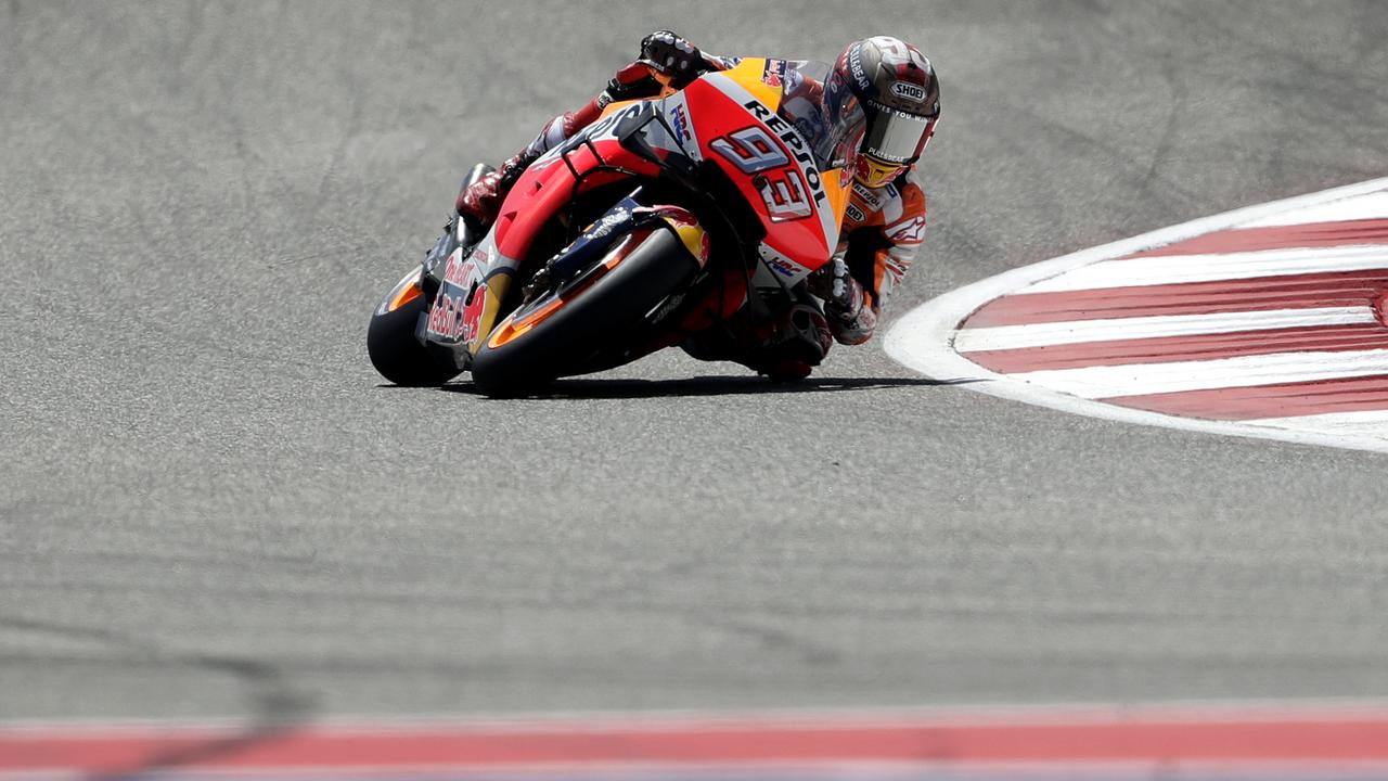 Marc Marquez (93), of Spain, leans through a turn during a qualifying for the Grand Prix of the Americas