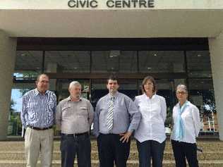 Chamber of Commerce president Jeremy Challacombe (left), CHESS employment manager Jock McNamara, Mayor Richie Williamson, North Coast rapid response team co-ordinator Chris Pauling and community programs client services manager Annette Rushby discuss assistance available for displaced abattoir workers.