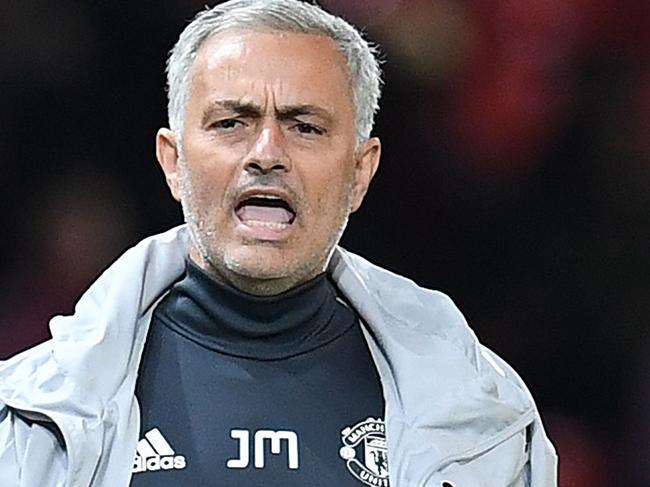 Manchester United's Portuguese manager Jose Mourinho shouts instructions to his players from the touchline during the English League Cup third round football match between Manchester United and Burton Albion at Old Trafford in Manchester on September 20, 2017. / AFP PHOTO / Paul ELLIS / RESTRICTED TO EDITORIAL USE. No use with unauthorized audio, video, data, fixture lists, club/league logos or 'live' services. Online in-match use limited to 75 images, no video emulation. No use in betting, games or single club/league/player publications.  /