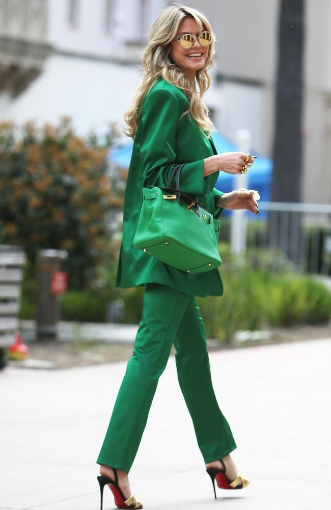 Heidi Klum, 50, looked every inch the fashion queen wearing a power suit in her favourite colour - green - to film America’s Got Talent. Picture: Phamous / BACKGRID