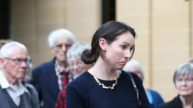 Sarah Bowles, the daughter of Sue Neill-Fraser, leaves the Hobart Supreme Court after a directions hearing.