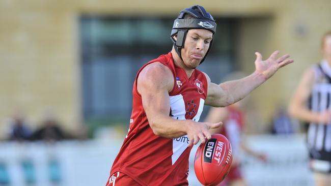 Luke Ivens in action for North Adelaide in 2012.