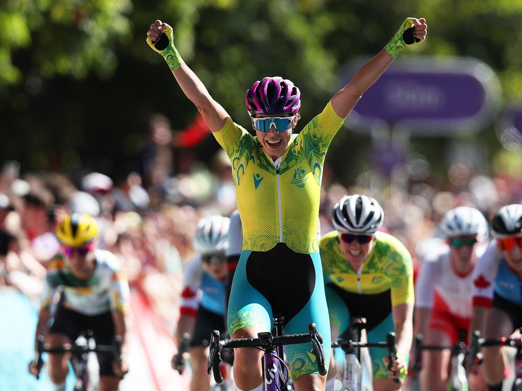 WARWICK, ENGLAND - AUGUST 07: Georgia Baker of Team Australia celebrates as they cross the line to win Gold in the Women's Road Race on day ten of the Birmingham 2022 Commonwealth Games at  on August 07, 2022 on the Warwick, England. (Photo by Alex Livesey/Getty Images)