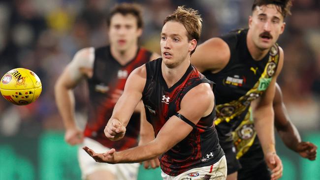 Parish shoots out a handball. Picture: Michael Willson/AFL Photos via Getty Images