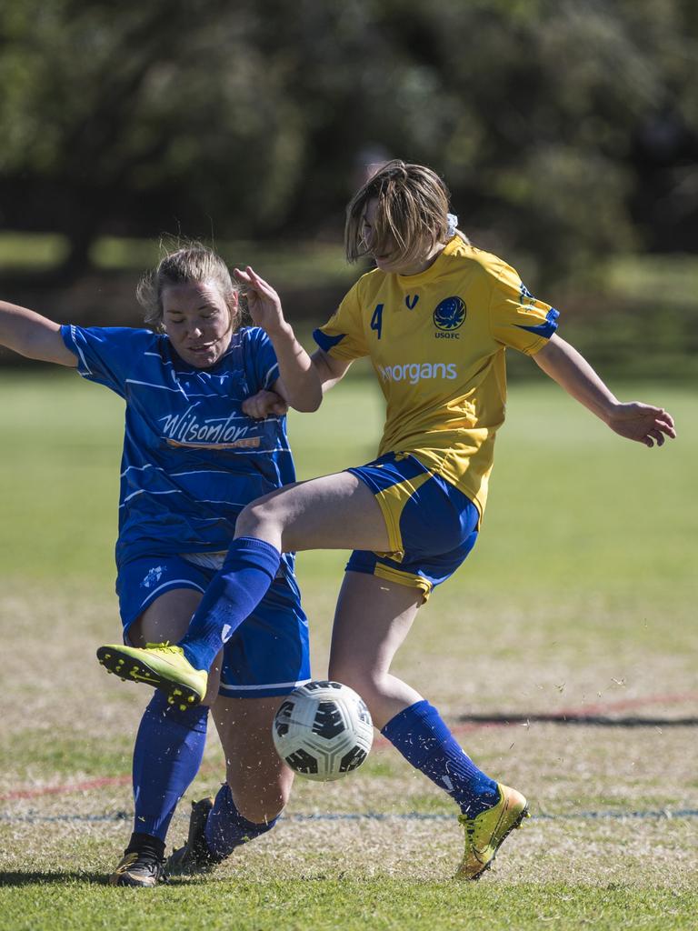 Nicole Mairs (left) of Rockville Rovers and Caitlyn Stocker of USQ FC in Toowoomba Football League Premier Women round 14 at Captain Cook ovals, Sunday, July 18, 2021. Picture: Kevin Farmer