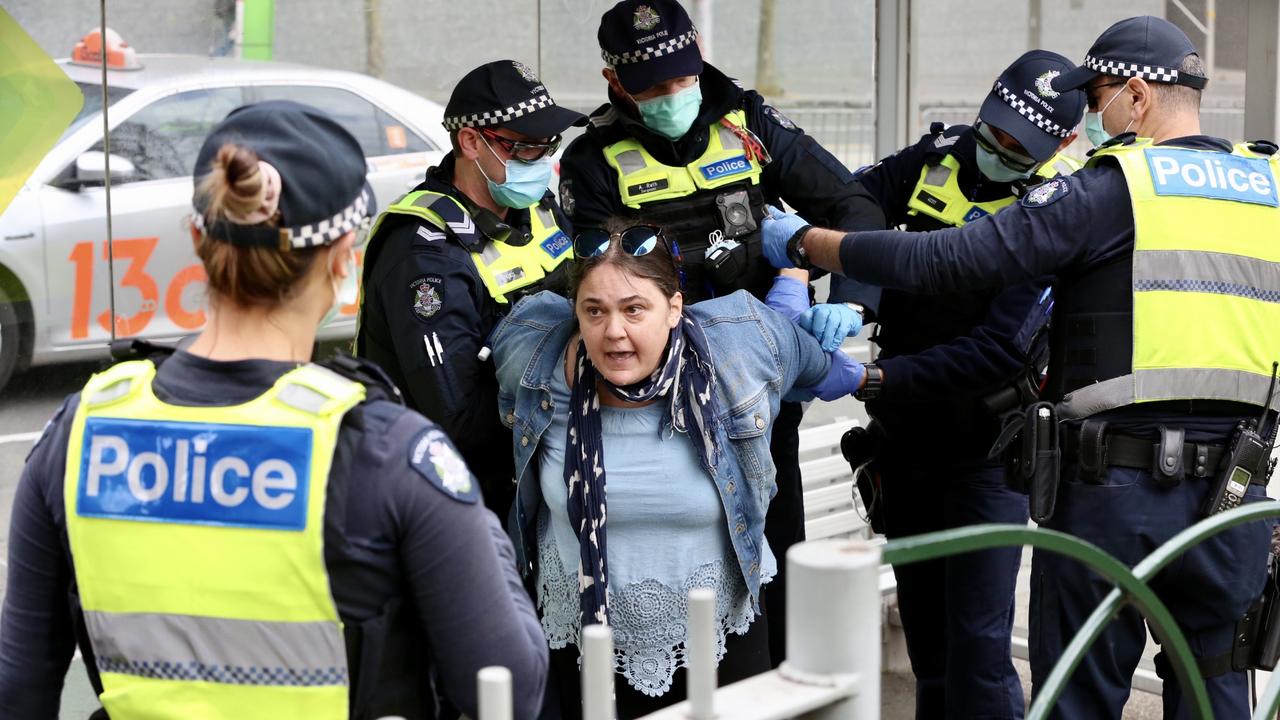 Lockdown protesters clashing with Police in Melbourne on Saturday.