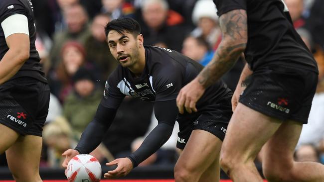Shaun Johnson passes the ball during the Four Nations final.