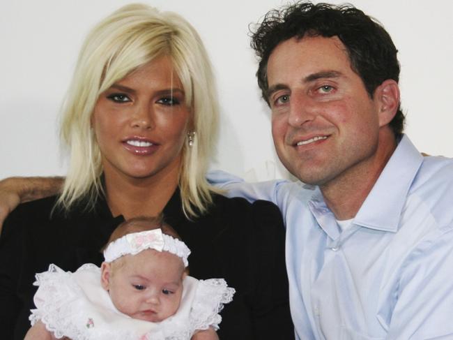 Anna Nicole Smith, holding her daughter, Dannielynn Hope, and Howard K. Stern, who thought he was the father. Picture: AP/'Entertainment Tonight