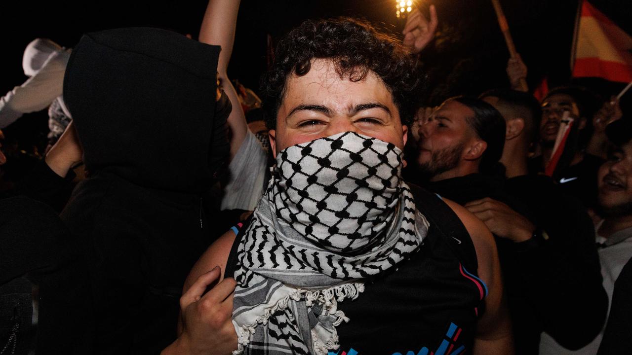 Pro-Palestine supporters are rallying at Sydney Town Hall as the conflict between Israel and Palestinians escalates. They marched form Town Hall to the Sydney Opera House. Picture: David Swift