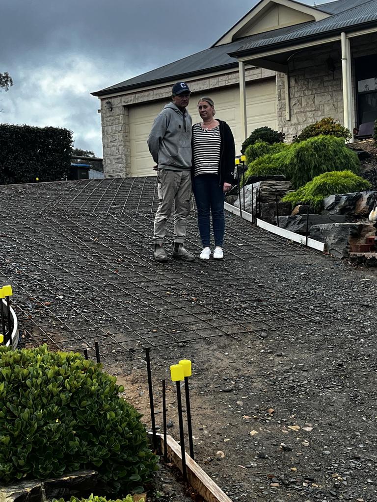Craig and Paula Miels from Mount Barker are owed nearly $15k for their driveway that has been left half finished and unusable by Adelaide Exposed Concrete for more than three weeks. Picture: Supplied