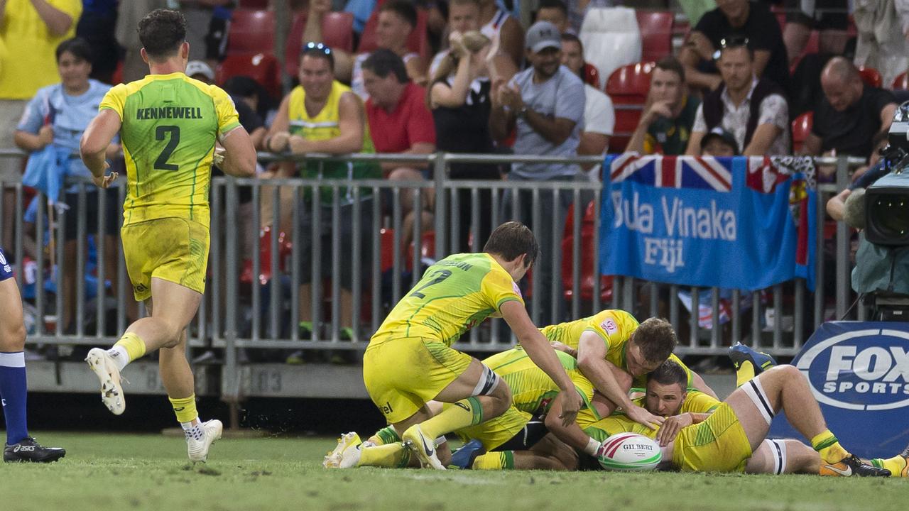 Australia celebrate scoring after fulltime to progress at Spotless Stadium in Sydney.