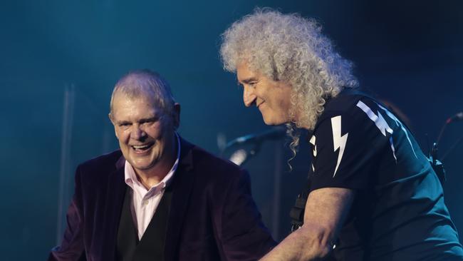 Farnham with Brian May of Queen during Fire Fight Australia at ANZ Stadium, February 16, 2020 in Sydney. Photo by Cole Bennetts/Getty Images.