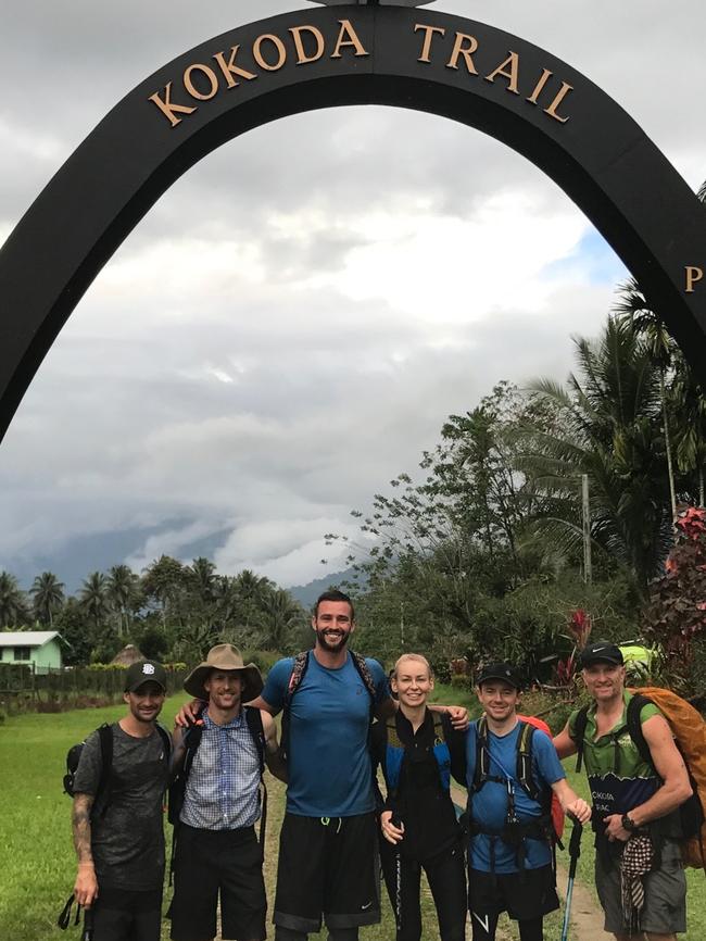 Smith with the group of charity walkers at the completion of the Kokoda Trail.