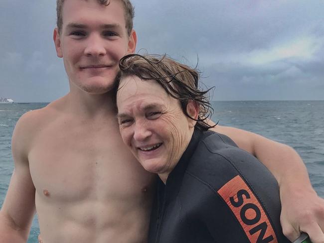 Martin with his mum Maxine, who is a teacher.