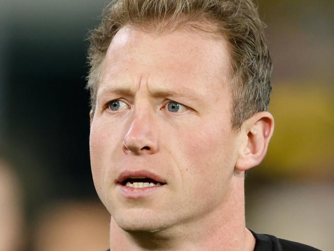 MELBOURNE, AUSTRALIA - APRIL 24: Dylan Grimes of the Tigers enters the field for the warm up before the 2024 AFL Round 07 match between the Richmond Tigers and the Melbourne Demons at the Melbourne Cricket Ground on April 24, 2024 in Melbourne, Australia. (Photo by Dylan Burns/AFL Photos via Getty Images)