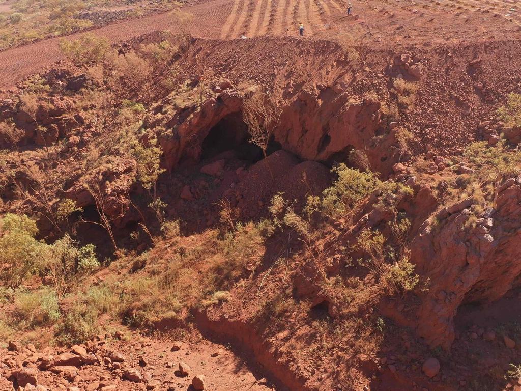 (FILES) This handout file photo taken on May 15, 2020 and released by the PKKP Aboriginal Corporation and received by AFP on May 27, 2020 shows Juukan Gorge in Western Australia -- one of the earliest known sites occupied by Aboriginals in Australia. - Rio Tinto announced the resignation of its CEO and two top lieutenants on September 11, 2020 over the mining giant's destruction of a 46,000-year-old Aboriginal site to expand an iron ore mine in Australia. The Anglo-Australian firm faced a growing investor revolt over the destruction of the sacred site in the Juukan Gorge in Western Australia's remote Pilbara region -- one of the earliest known locations inhabited by Australia's indigenous people. (Photo by Handout / PKKP Aboriginal Corporation / AFP) / RESTRICTED TO EDITORIAL USE - MANDATORY CREDIT "AFP PHOTO / PKKP ABORIGINAL CORPORATION" - NO MARKETING NO ADVERTISING CAMPAIGNS - DISTRIBUTED AS A SERVICE TO CLIENTS - NO ARCHIVES