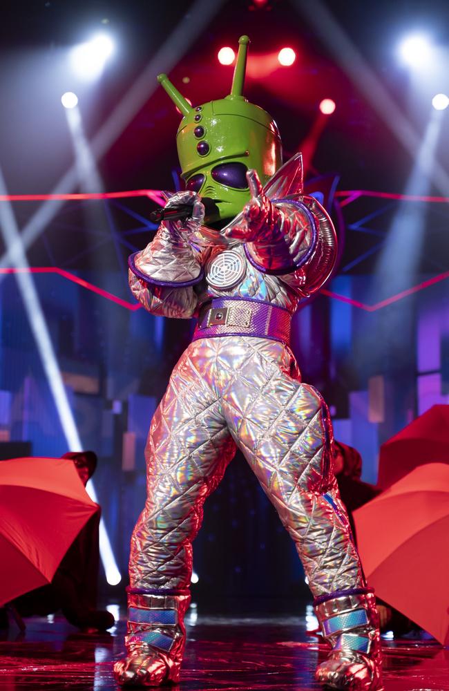 Strawberry Kisses And Farewell Hugs — Nikki Webster revealed a the alien on The Masked Singer Australia. Picture: 10