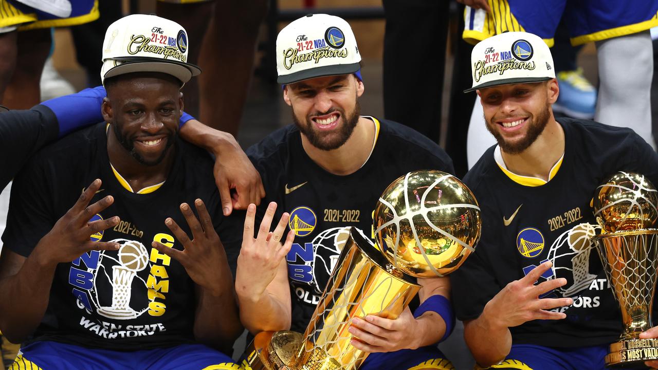 BOSTON, MASSACHUSETTS - JUNE 16: Andre Iguodala #9, Draymond Green #23, Klay Thompson #11 and Stephen Curry #30 of the Golden State Warriors pose for a photo after defeating the Boston Celtics 103-90 in Game Six of the 2022 NBA Finals at TD Garden on June 16, 2022 in Boston, Massachusetts. NOTE TO USER: User expressly acknowledges and agrees that, by downloading and/or using this photograph, User is consenting to the terms and conditions of the Getty Images License Agreement. (Photo by Adam Glanzman/Getty Images)