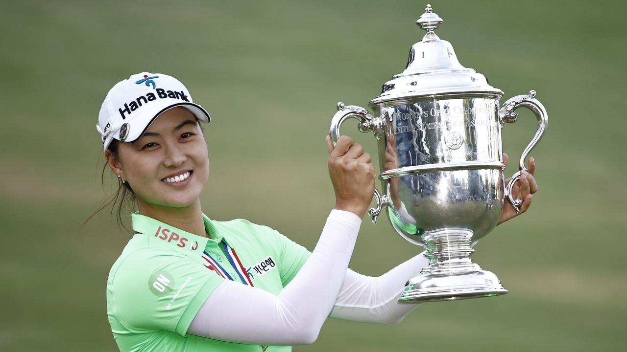 Australian golfer Minjee Lee raises the US Open trophy after winning the tournament on June 5, 2022. Picture: Getty Images/AFP