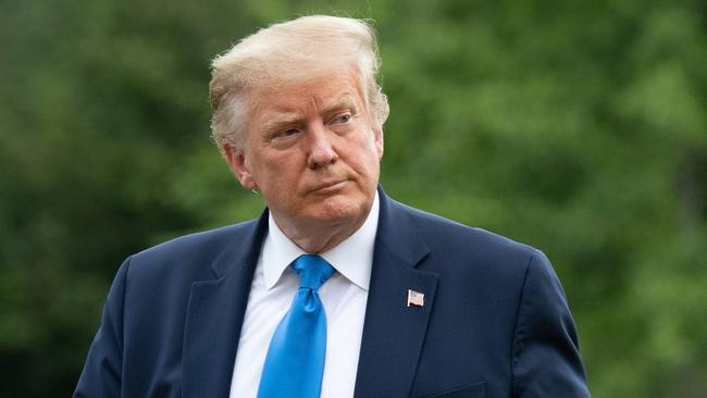 Donald Trump walks from Marine One after arriving on the South Lawn as he returns to the White House in Washington, DC, on July 11, 2020, after visiting Walter Reed National Military Medical Center. (Photo by SAUL LOEB / AFP)