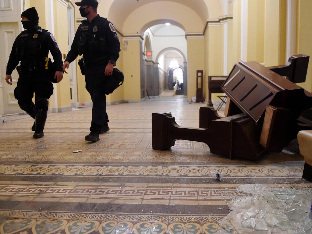 The riot was eventually subdued and Congress reconvened at 8pm local time. Picture: Olivier DOULIERY / AFP