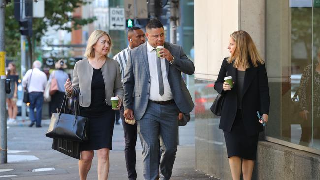 Hayne flanked by his legal team. Picture: NCA NewsWire/Richard Dobson