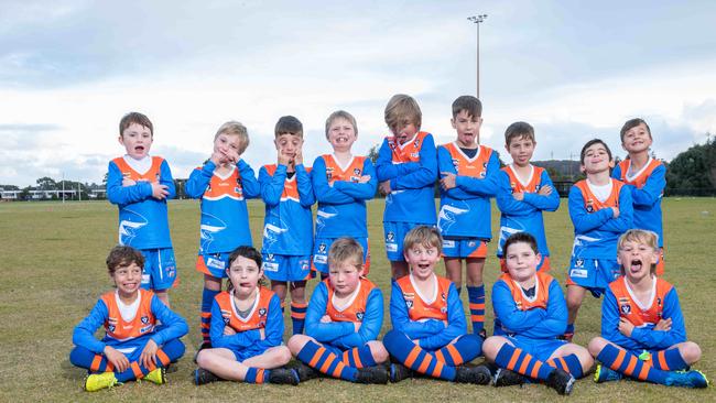 Armstrong Creek Spinner Sharks under-9 football team pull their funniest faces.
