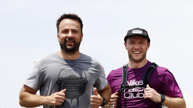 Runners from left Henry-John Davis, 38, and Wouter Le Fevre, 43 are excited to see Sydney included in the majors. Picture: Jonathan Ng