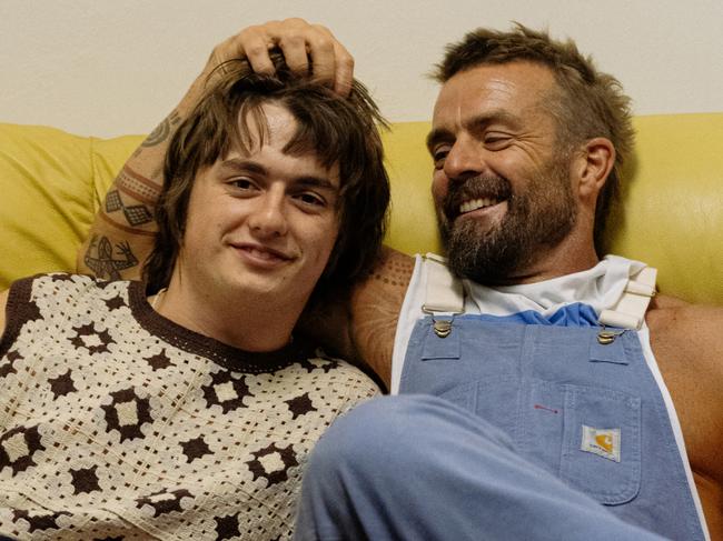 ***EXCLUSIVE FOR THE AUSTRALIAN ONLY***, 06/10/2024: Australian roots singer-songwriter Xavier Rudd (right) pictured with his son and fellow musician Finojet Rudd (left) backstage at The Barracks Precinct in Manly, NSW, where Finojet's band Calypso Cora was supporting his father on Xavier Rudd's Freedom Sessions tour. Picture: Mikey Conlon