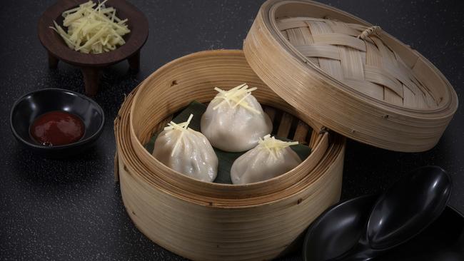 The xiao long bao deliver a good squirt of soup.