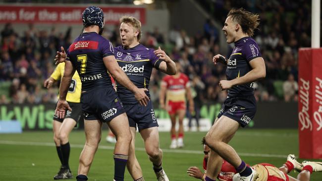 MELBOURNE, AUSTRALIA - AUGUST 24: Jahrome Hughes of the Storm celebrates kicking a goal during the round 25 NRL match between Melbourne Storm and Dolphins at AAMI Park, on August 24, 2024, in Melbourne, Australia. (Photo by Daniel Pockett/Getty Images)