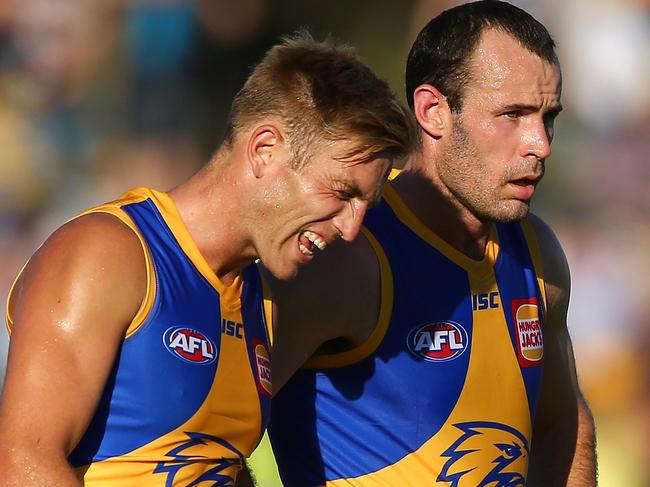 PERTH, AUSTRALIA - MARCH 11: Brad Sheppard and Shannon Hurn of the Eagles walk from the field at the half time break during the JLT Community Series AFL match between the Fremantle Dockers and the West Coast Eagles at HBF Arena on March 11, 2018 in Perth, Australia.  (Photo by Paul Kane/Getty Images)