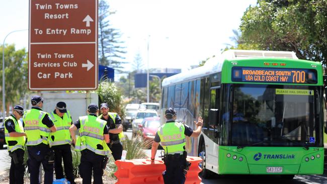 Queensland Police stop and check buses trying to enter Queensland from NSW through Tweed Heads in late December. Picture: Scott Powick