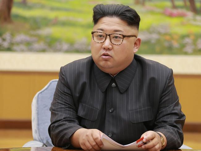 North Korean leader Kim Jong-Un attending a meeting with a committee of the Workers' Party of Korea about the test of a hydrogen bomb, at an unknown location. Picture: AFP