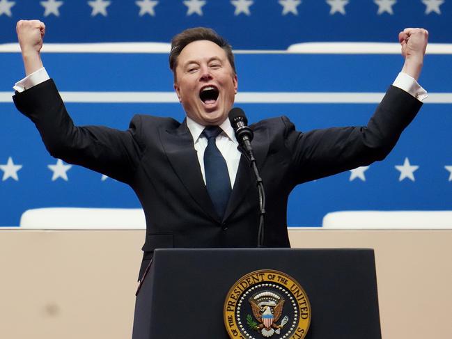 WASHINGTON, DC - JANUARY 20: Tesla, SpaceX and X CEO Elon Musk arrives to speak during an inauguration event at Capital One Arena on January 20, 2025 in Washington, DC. Donald Trump takes office for his second term as the 47th president of the United States. (Photo by Christopher Furlong/Getty Images)