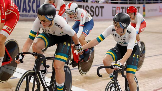 Australia's Amy Cure and Australia's Annette Edmondson hand over during the women's 30km Madison final at the UCI track cycling World Championship at the velodrome in Berlin on February 29, 2020. (Photo by Odd ANDERSEN / AFP)