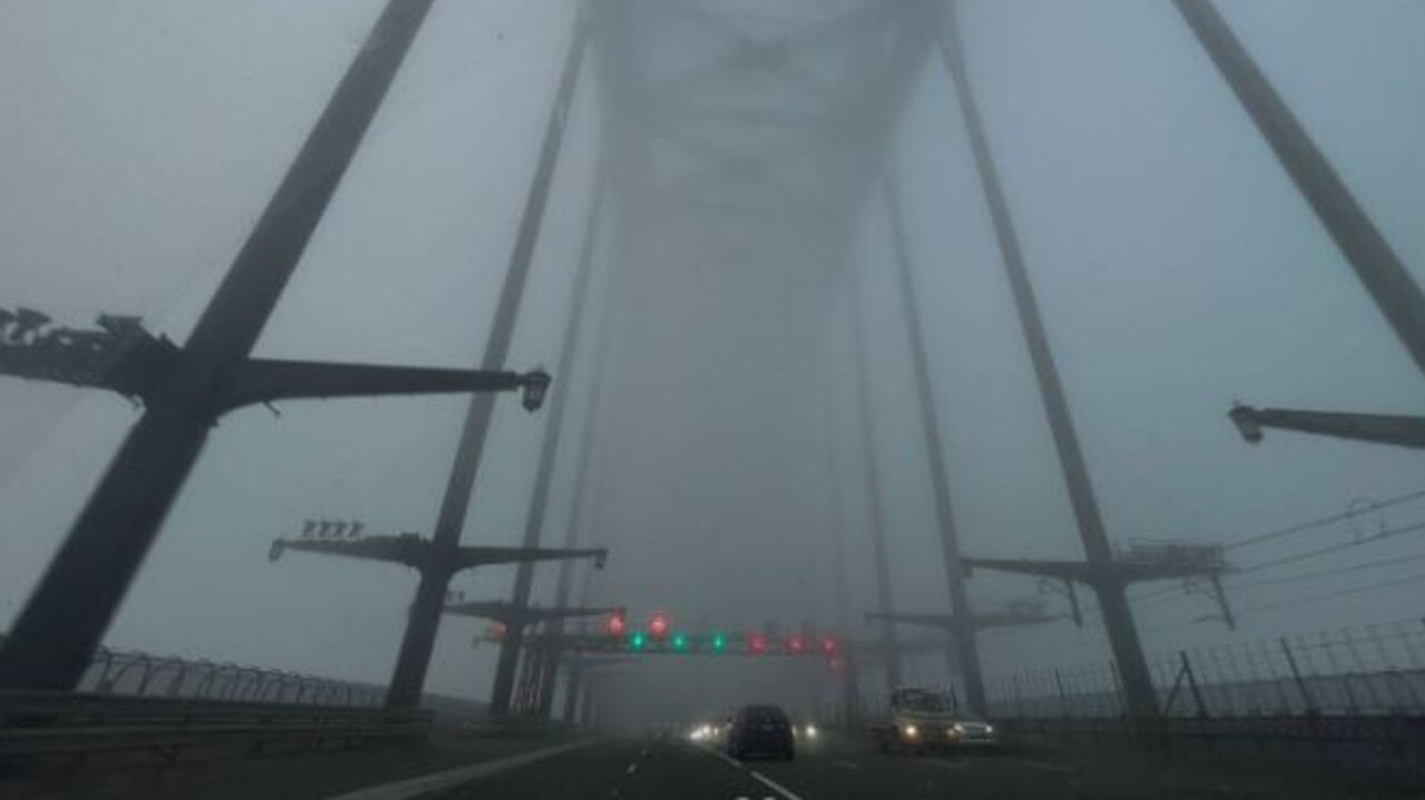 The Sydney Harbour Bridge covered in a thick fog. Picture: Instagram/klr_redv6