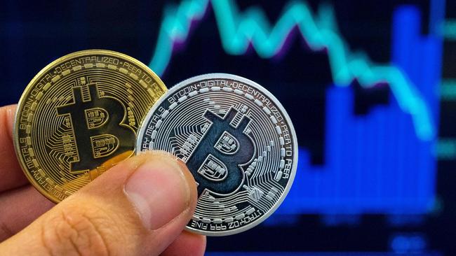 A visual representation of the digital cryptocurrency Bitcoin, at the "Bitcoin Change" shop in the Israeli city of Tel Aviv. Picture: Jack Guez/AFP