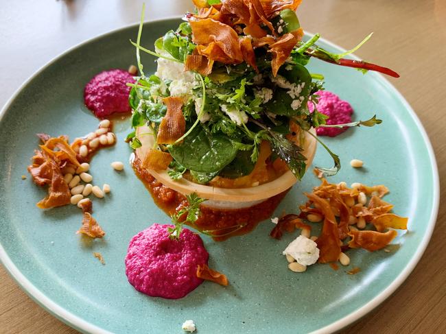 Roasted pumpkin and feta tart with beetroot tapenade, topped with crispy sweet potato and harissa. Photo: Dianne Mattsson