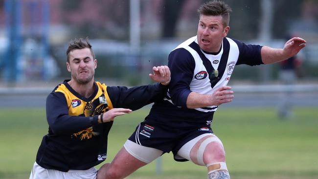 Gary Moorcroft snaps around the body against Whittlesea this year.