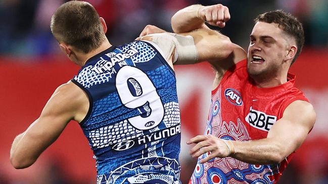 SYDNEY, AUSTRALIA - MAY 26:  Tom Papley of the Swans challenges Patrick Cripps of the Blues after kicking a goal during the round 11 AFL match between Sydney Swans and Carlton Blues at Sydney Cricket Ground, on May 26, 2023, in Sydney, Australia. (Photo by Matt King/AFL Photos/via Getty Images )