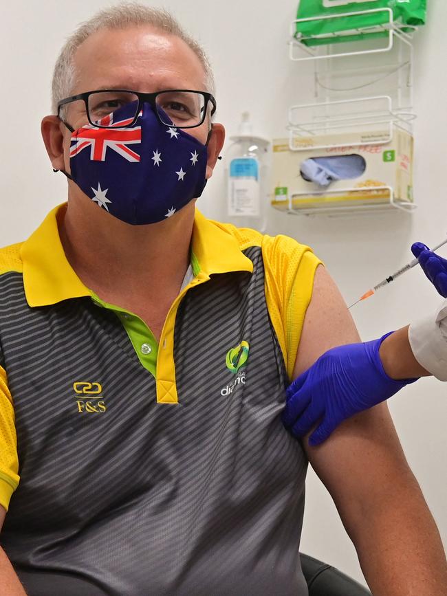 Prime Minister Scott Morrison receives a dose of the Pfizer vaccine. Picture: Steven Saphore/AFP