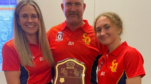 Scout Strong, team manager Mark Mason and Bo Tankey with the winner's shield following South Queensland's big win over North Queensland. Picture: supplied