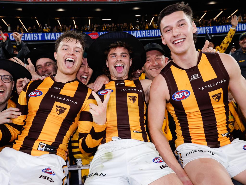 MELBOURNE, AUSTRALIA - SEPTEMBER 06: Jack Ginnivan, Nick Watson and Connor Macdonald of the Hawks pose for a photo during the 2024 AFL Second Elimination Final match between the Western Bulldogs and the Hawthorn Hawks at The Melbourne Cricket Ground on September 06, 2024 in Melbourne, Australia. (Photo by Dylan Burns/AFL Photos via Getty Images)