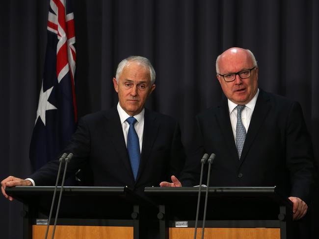 Prime Minister Malcolm Turnbull and Attorney-General George Brandis announced the amendments to the Racial Discrimination Act in Canberra today. Picture: Kym Smith