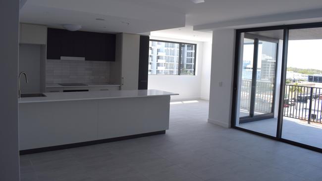 Kitchen and dining area in a three-bedroom unit on the sixth floor of the Loft Apartments.