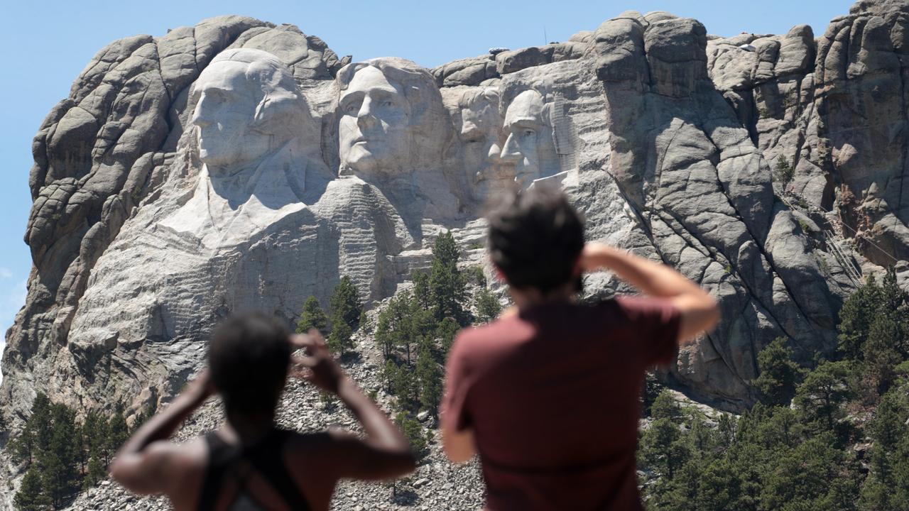 Former US presidents George Washington, Thomas Jefferson, Abraham Lincoln and Theodore Roosevelt are engraved into rock at the iconic Mount Rushmore in South Dakota. Picture: Scott Olson/Getty Images/AFP