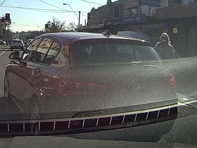 The BMW driver got out of her car to take photos following the bingle. Picture: Facebook